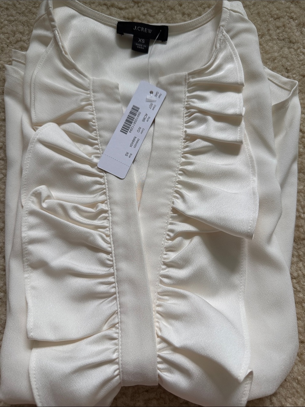 Brand new!!! J. Crew Ivory Ruffle Front Blouse size XS 100% polyester